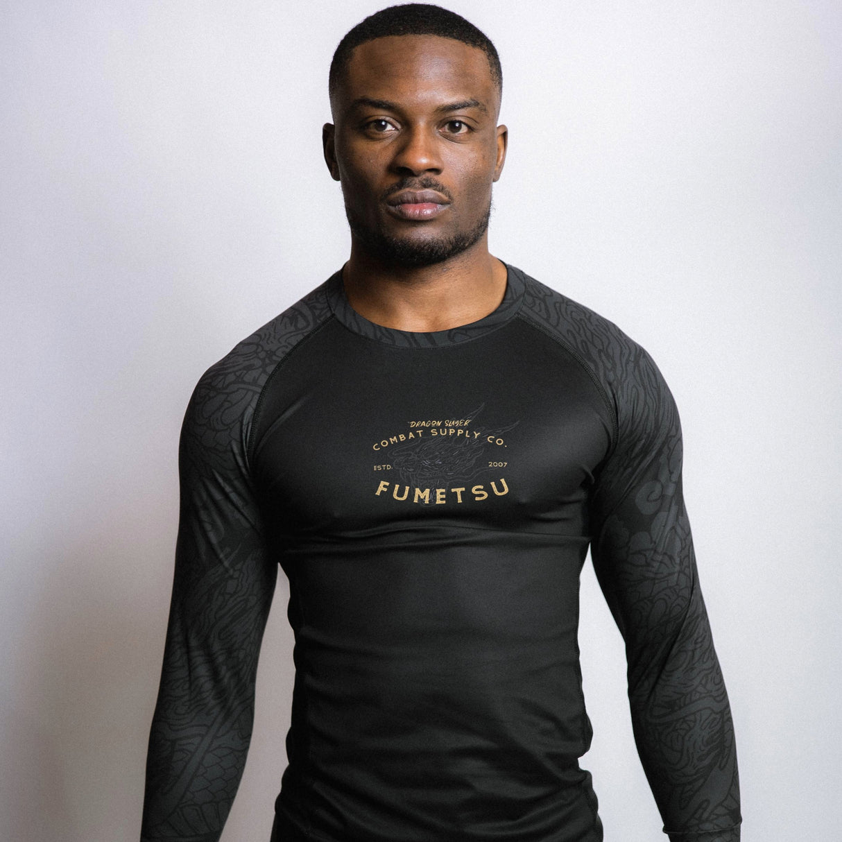 Fumetsu Dragon Slayer Long Sleeve Rash Guard Black/Gold at Bytomic Trade and Wholesale