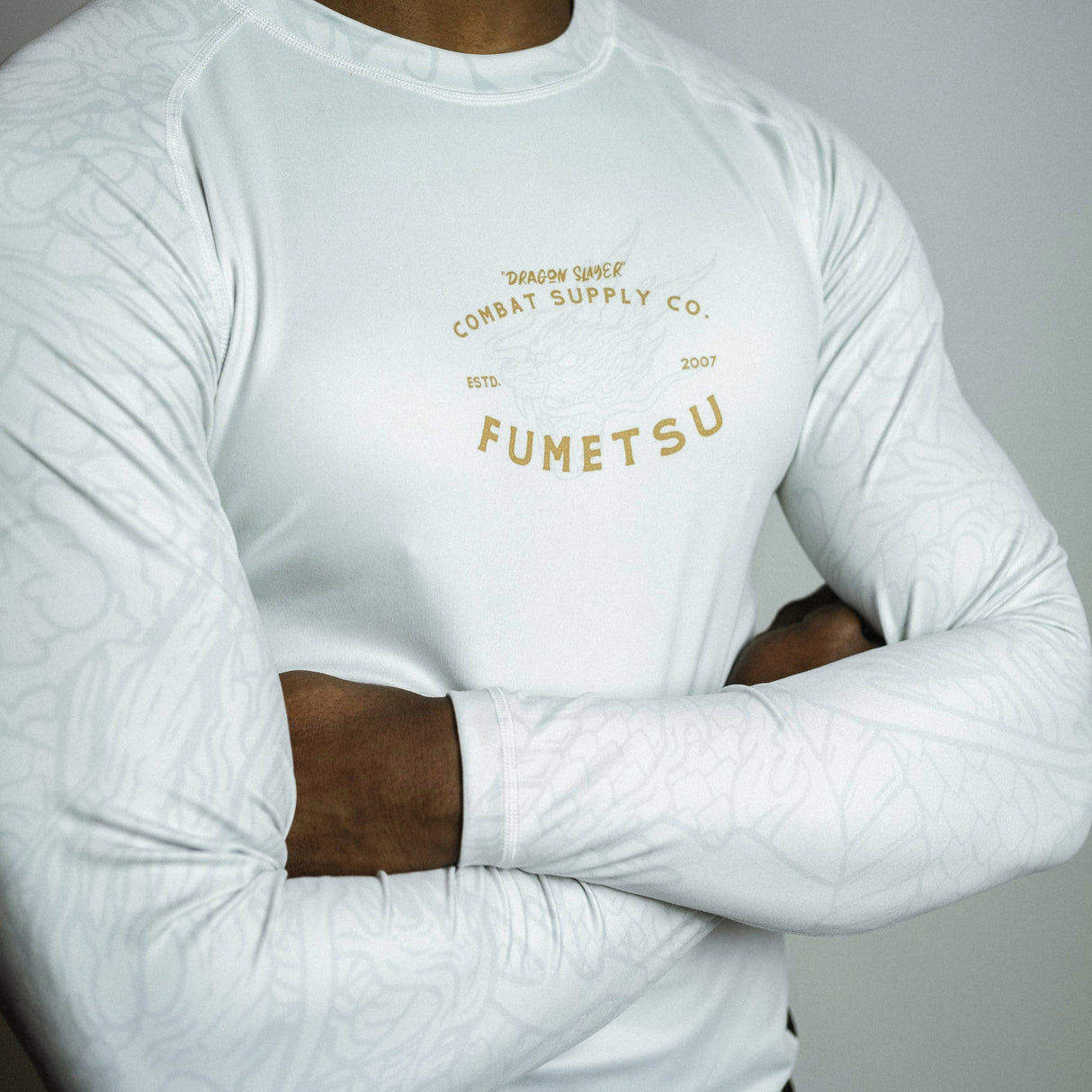 Fumetsu Dragon Slayer Long Sleeve Rash Guard White/Black/Gold at Bytomic Trade and Wholesale