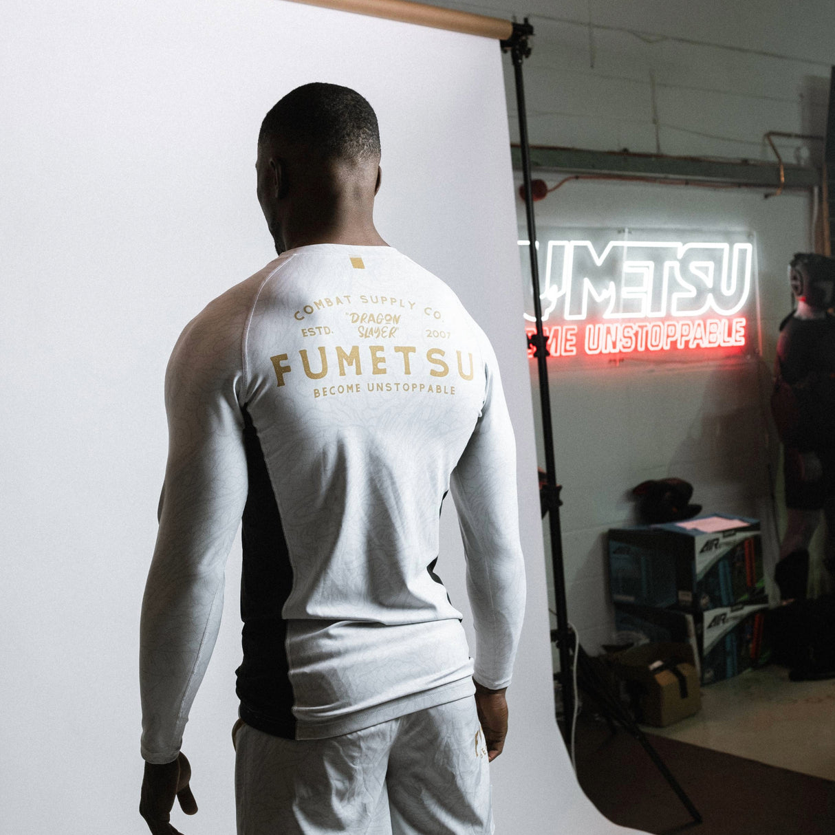 Fumetsu Dragon Slayer Long Sleeve Rash Guard White/Black/Gold at Bytomic Trade and Wholesale