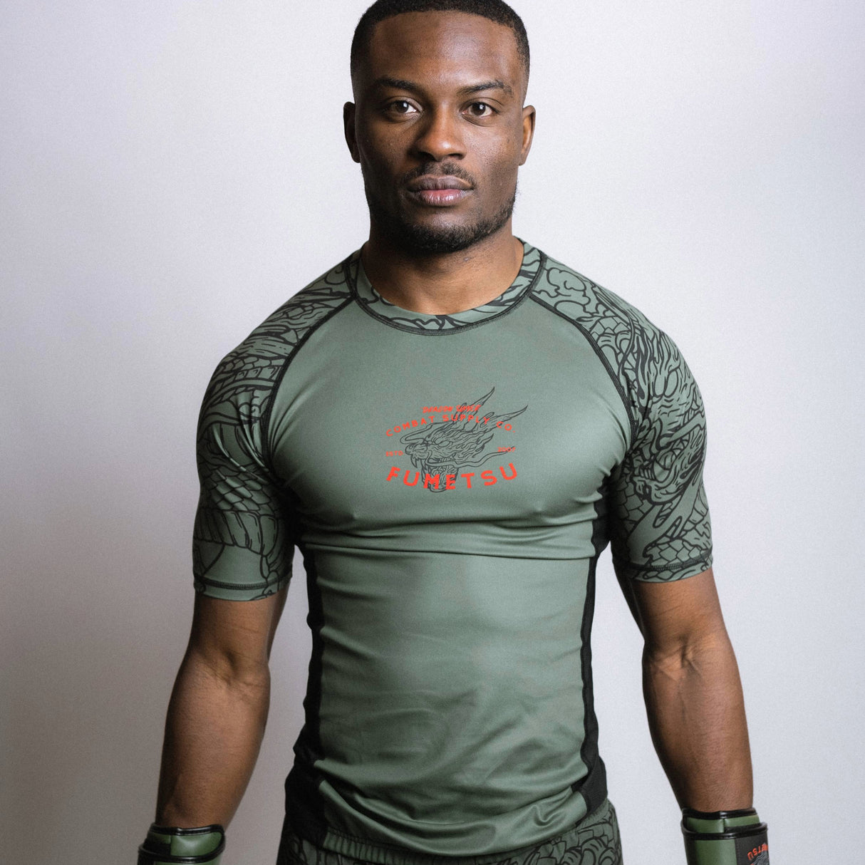 Fumetsu Dragon Slayer Short Sleeve Rash Guard Khaki/Orange at Bytomic Trade and Wholesale