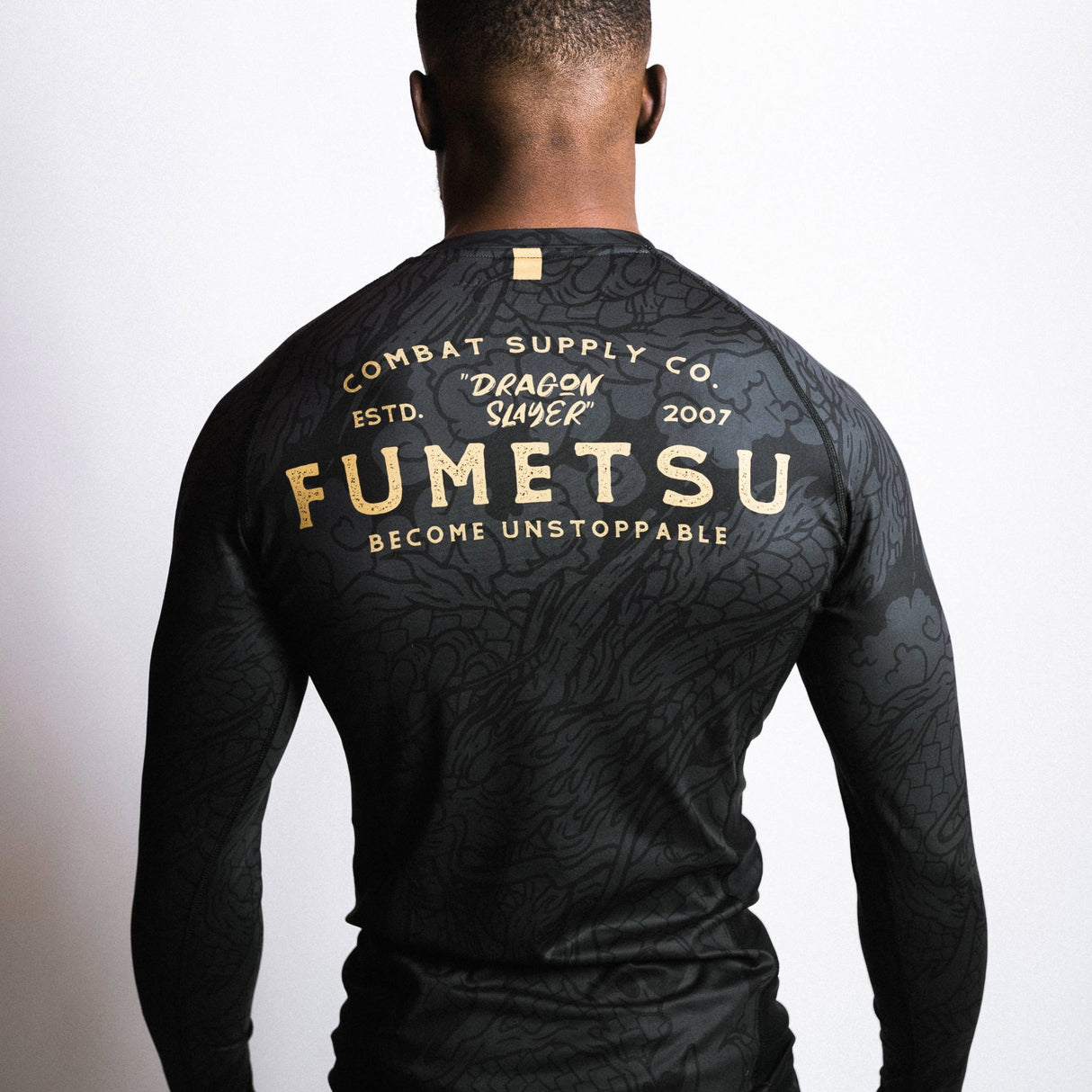 Fumetsu Dragon Slayer Long Sleeve Rash Guard Black/Gold at Bytomic Trade and Wholesale