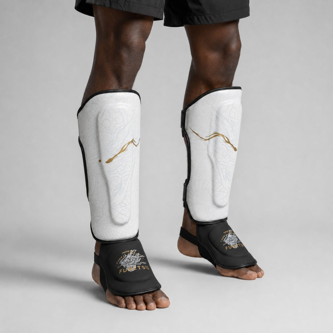 Fumetsu Dragon Slayer Shin Guards White/Black/Gold at Bytomic Trade & Wholesale 4