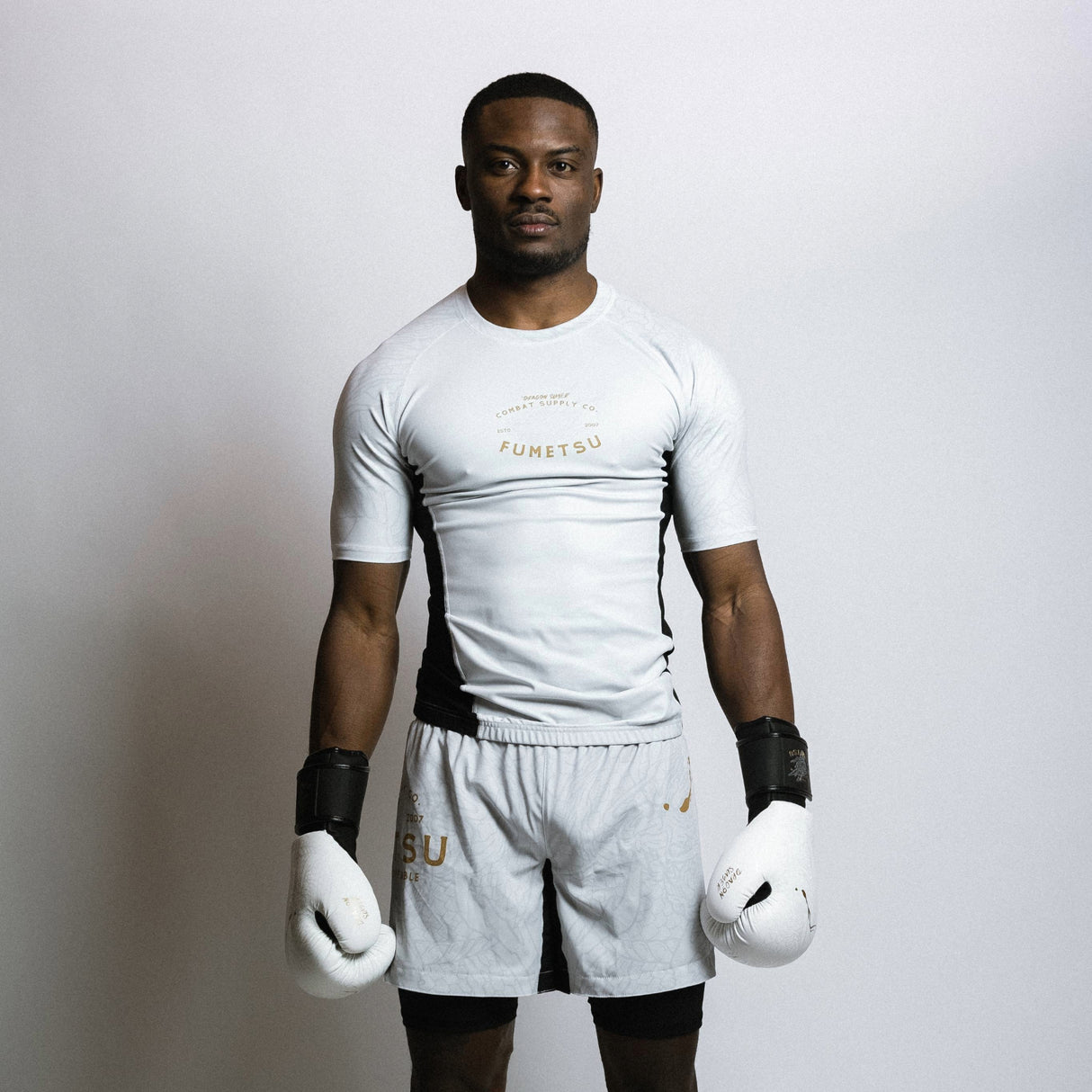 Fumetsu Dragon Slayer Short Sleeve Rash Guard White/Black/Gold at Bytomic Trade and Wholesale