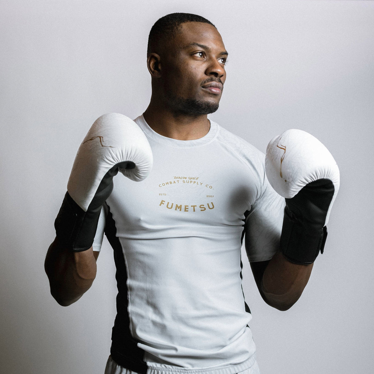 Fumetsu Dragon Slayer Short Sleeve Rash Guard White/Black/Gold at Bytomic Trade and Wholesale