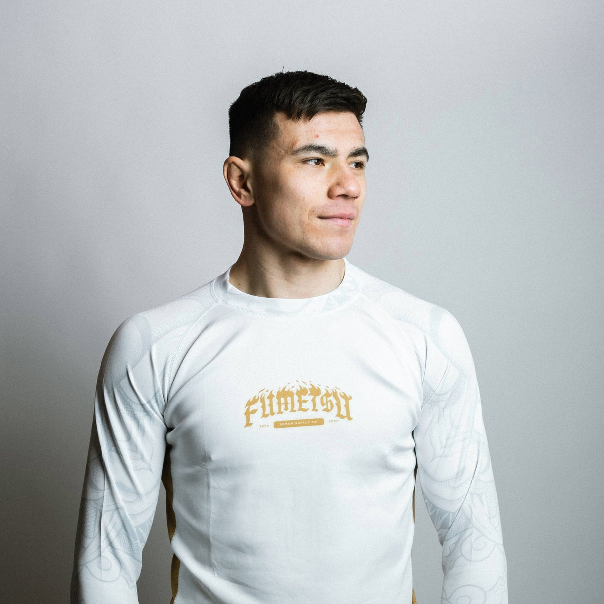 Fumetsu Oni Long Sleeve Rash Guard White/Gold/Grey at Bytomic Trade and Wholesale