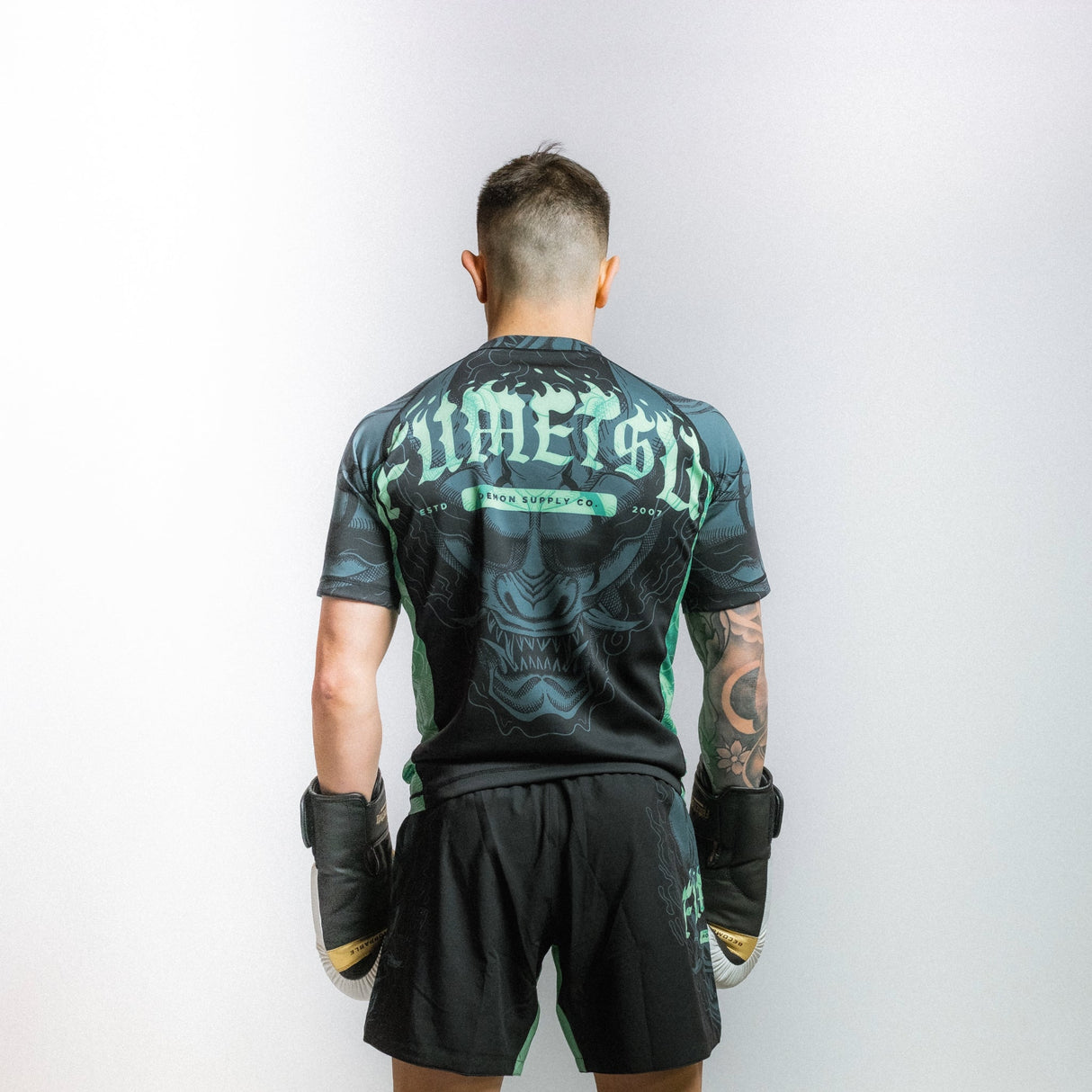 Fumetsu Oni Short Sleeve Rash Guard Black/Blue/Mint at Bytomic Trade and Wholesale