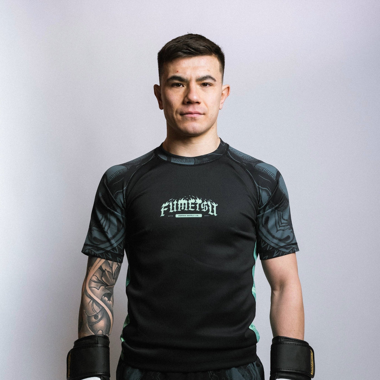Fumetsu Oni Short Sleeve Rash Guard Black/Blue/Mint at Bytomic Trade and Wholesale