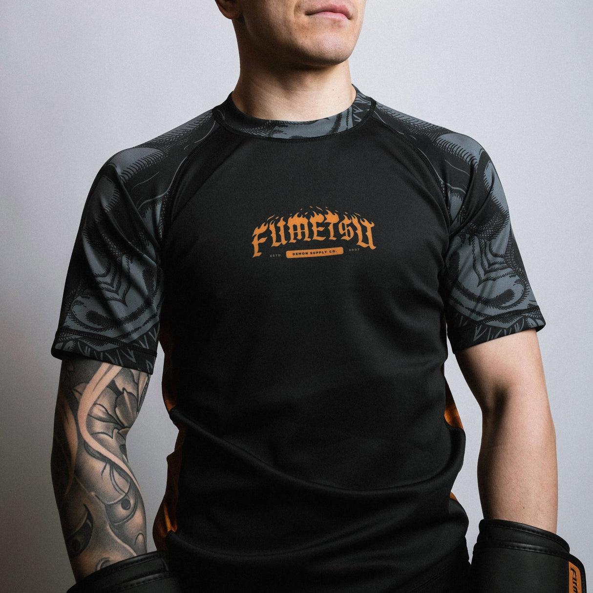 Fumetsu Oni Short Sleeve Rash Guard Black/Grey/Bronze at Bytomic Trade and Wholesale