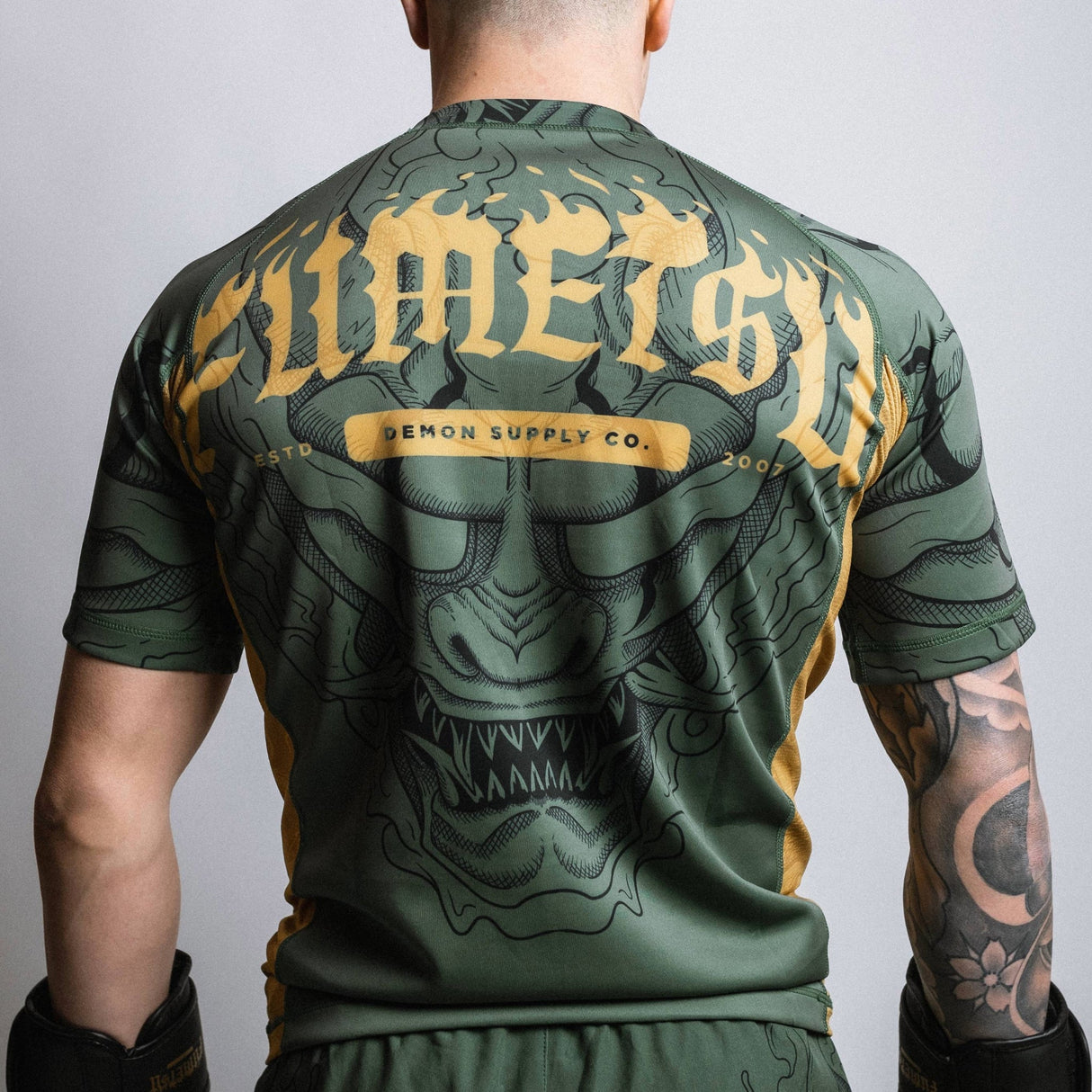 Fumetsu Oni Short Sleeve Rash Guard Khaki/Gold/Black at Bytomic Trade and Wholesale