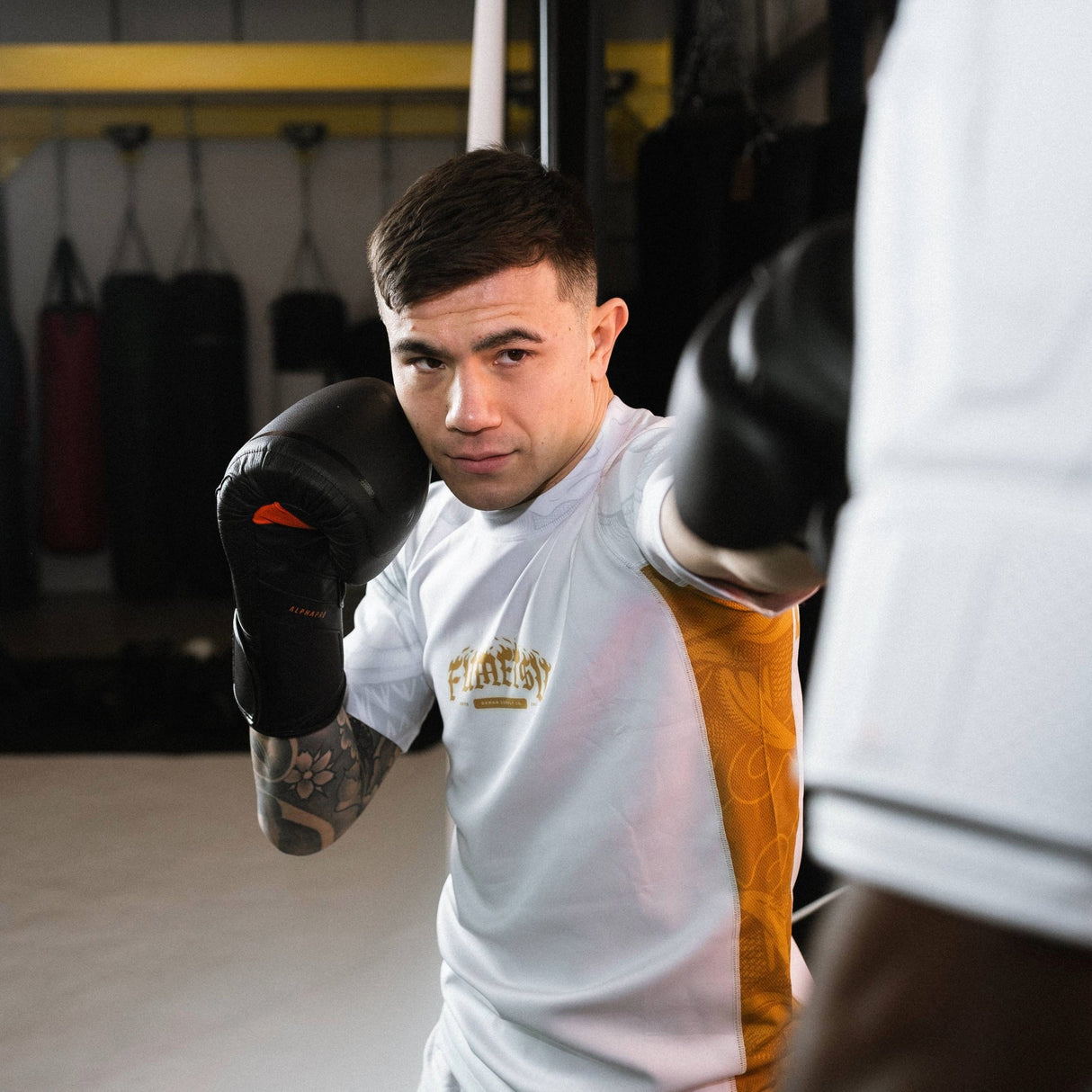 Fumetsu Oni Short Sleeve Rash Guard White/Gold/Grey at Bytomic Trade and Wholesale