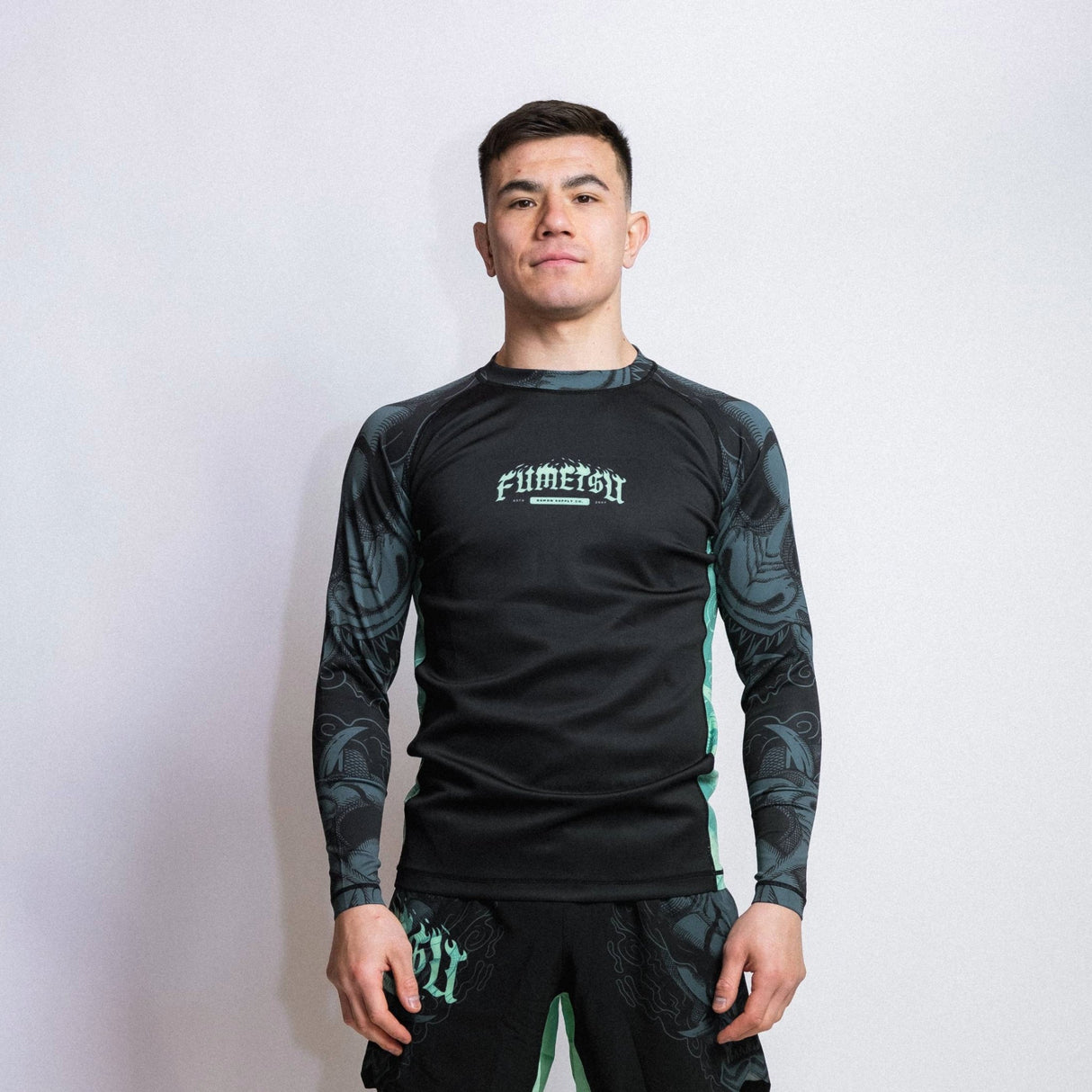 Fumetsu Oni Long Sleeve Rash Guard Black/Blue/Mint at Bytomic Trade and Wholesale