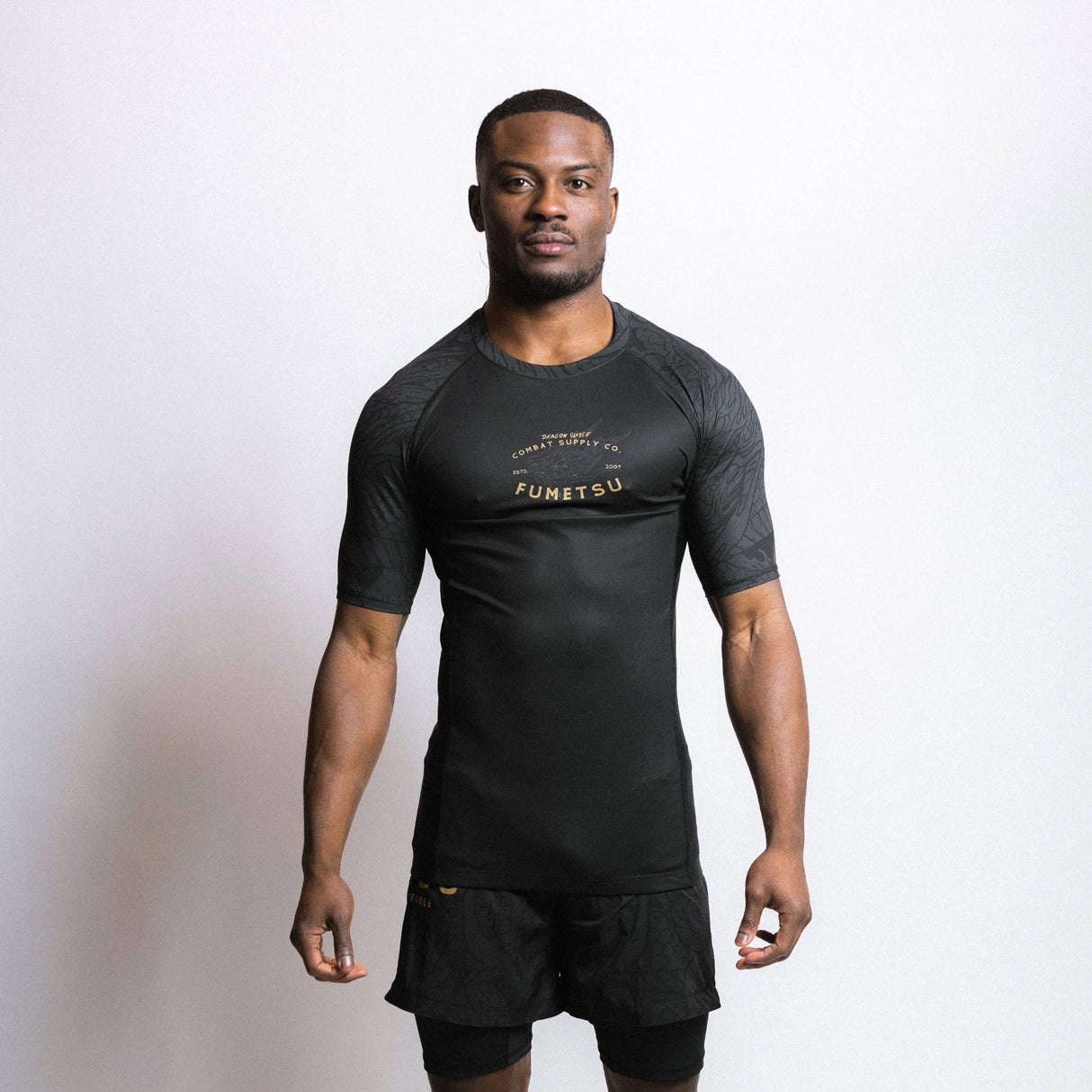 Fumetsu Dragon Slayer Short Sleeve Rash Guard Black/Gold at Bytomic Trade and Wholesale