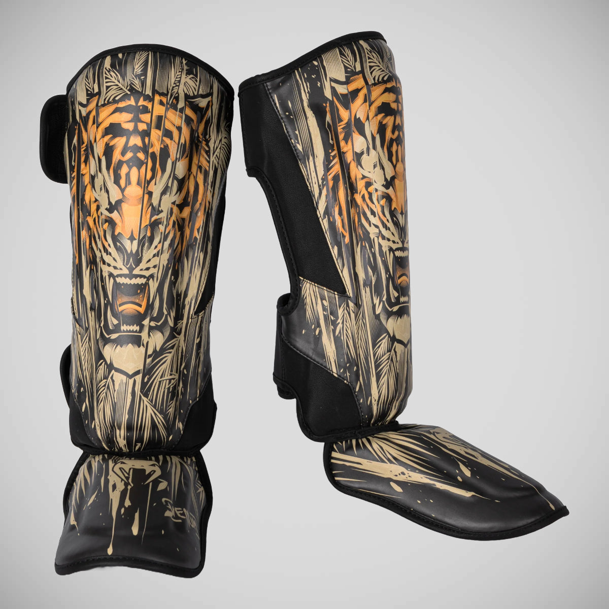 Venum Tiger Kids Shin Guards Black/Orange at Bytomic Trade and Wholesale