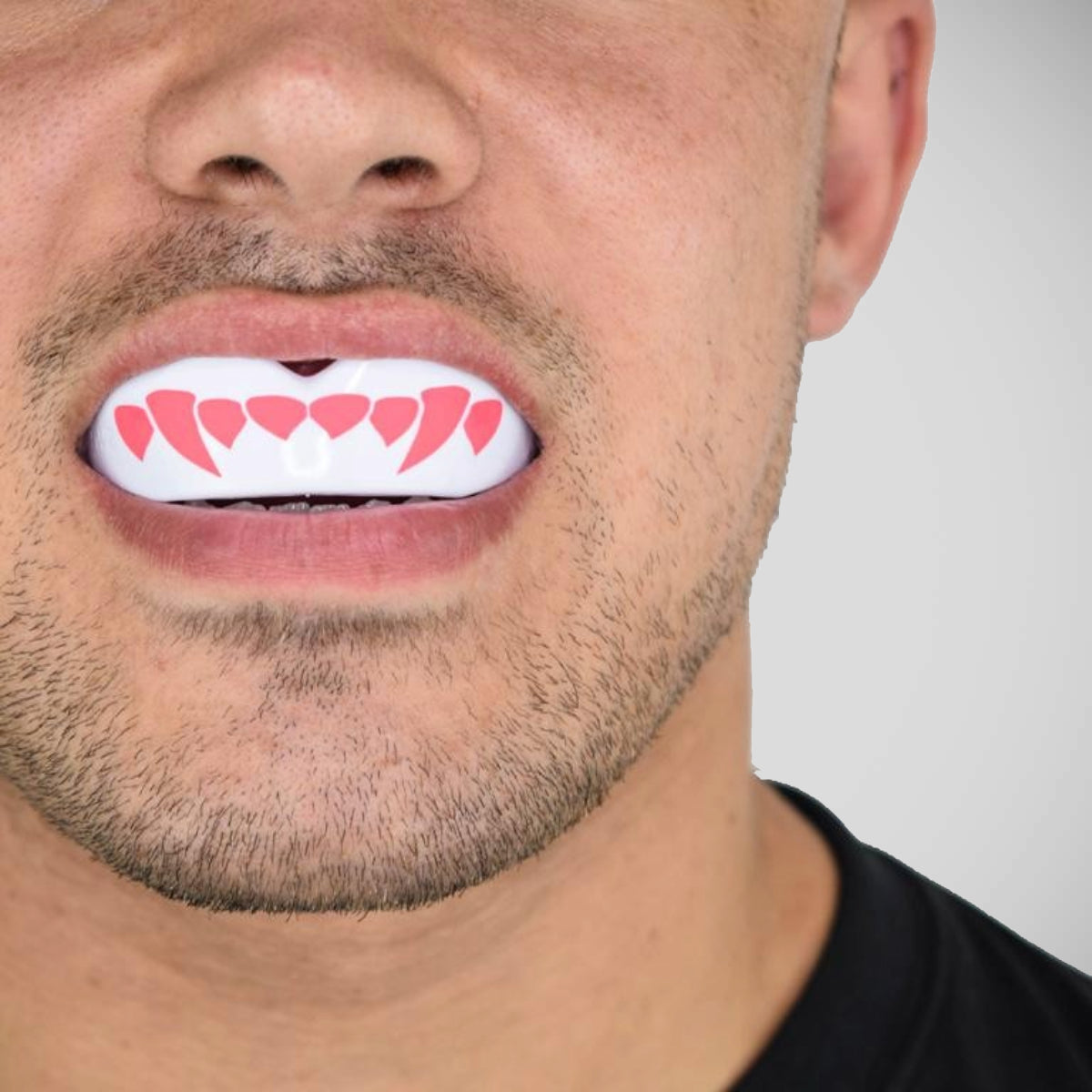 SafeJawz Extro Pink Fangs Mouth Guard White/Pink at Bytomic Trade and Wholesale