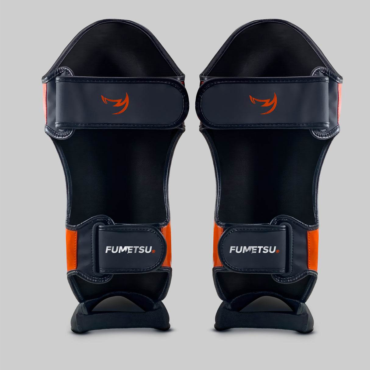 Fumetsu Icon Thai Shin Guards Black/Orange at Bytomic Trade and Wholesale