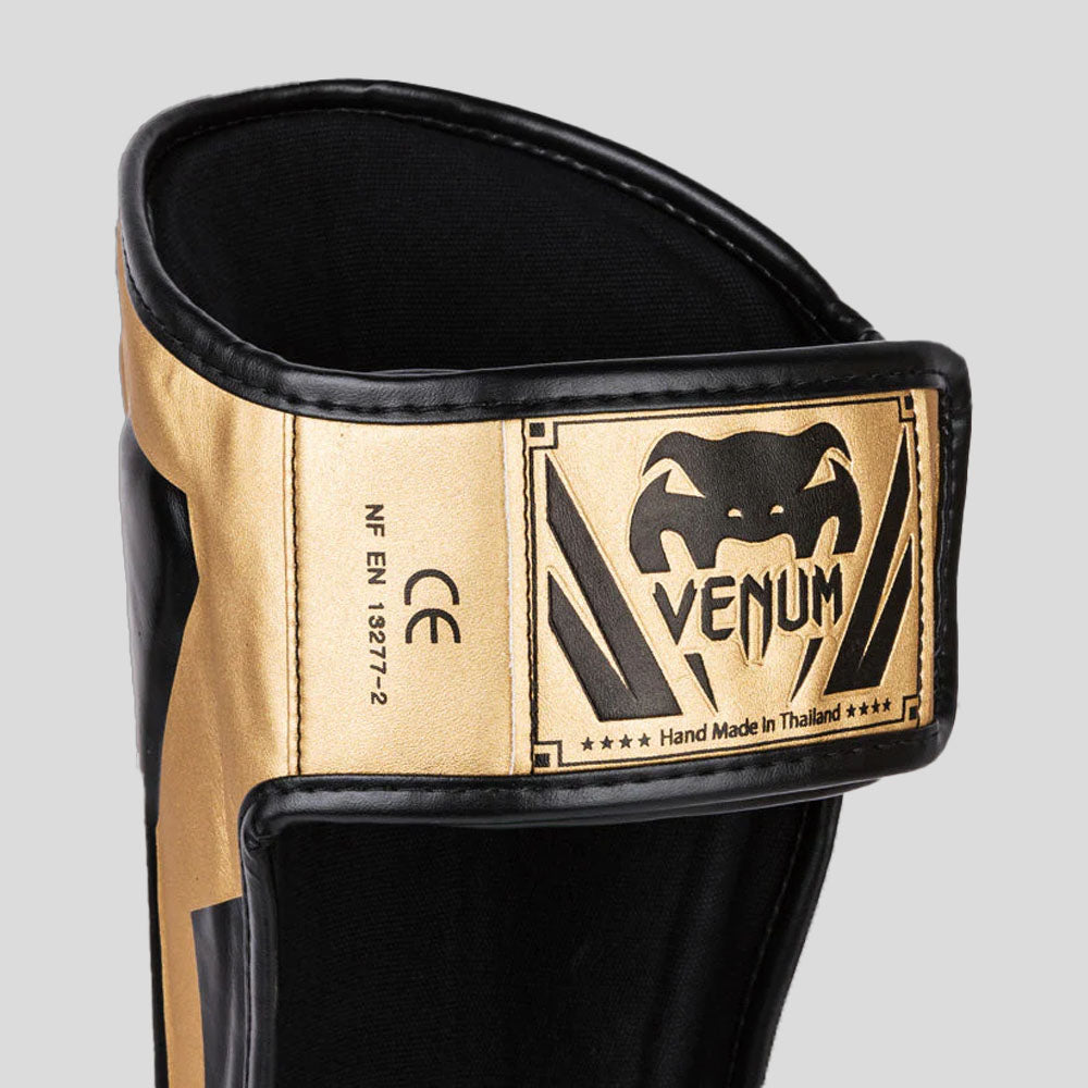 Venum Elite Stand Up Shin Guards Gold/Black at Bytomic Trade and Wholesale