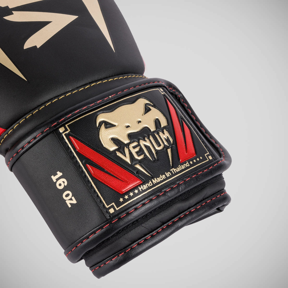 Black/Gold/Red Venum Elite Boxing Gloves at Bytomic Trade and Wholesale