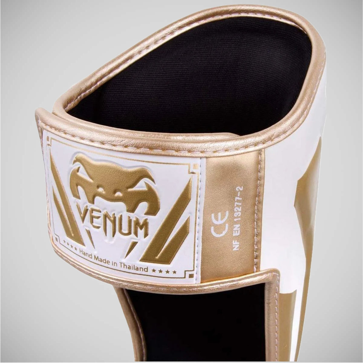 White Venum Elite Stand Up Shin Guards at Bytomic Trade and Wholesale