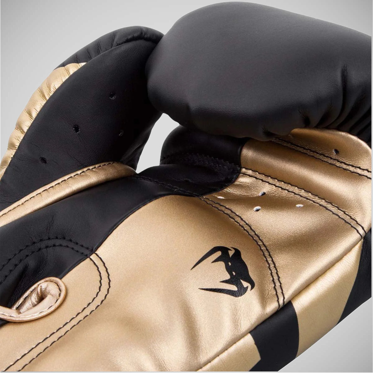 Black/Gold Venum Elite Boxing Gloves at Bytomic Trade and Wholesale