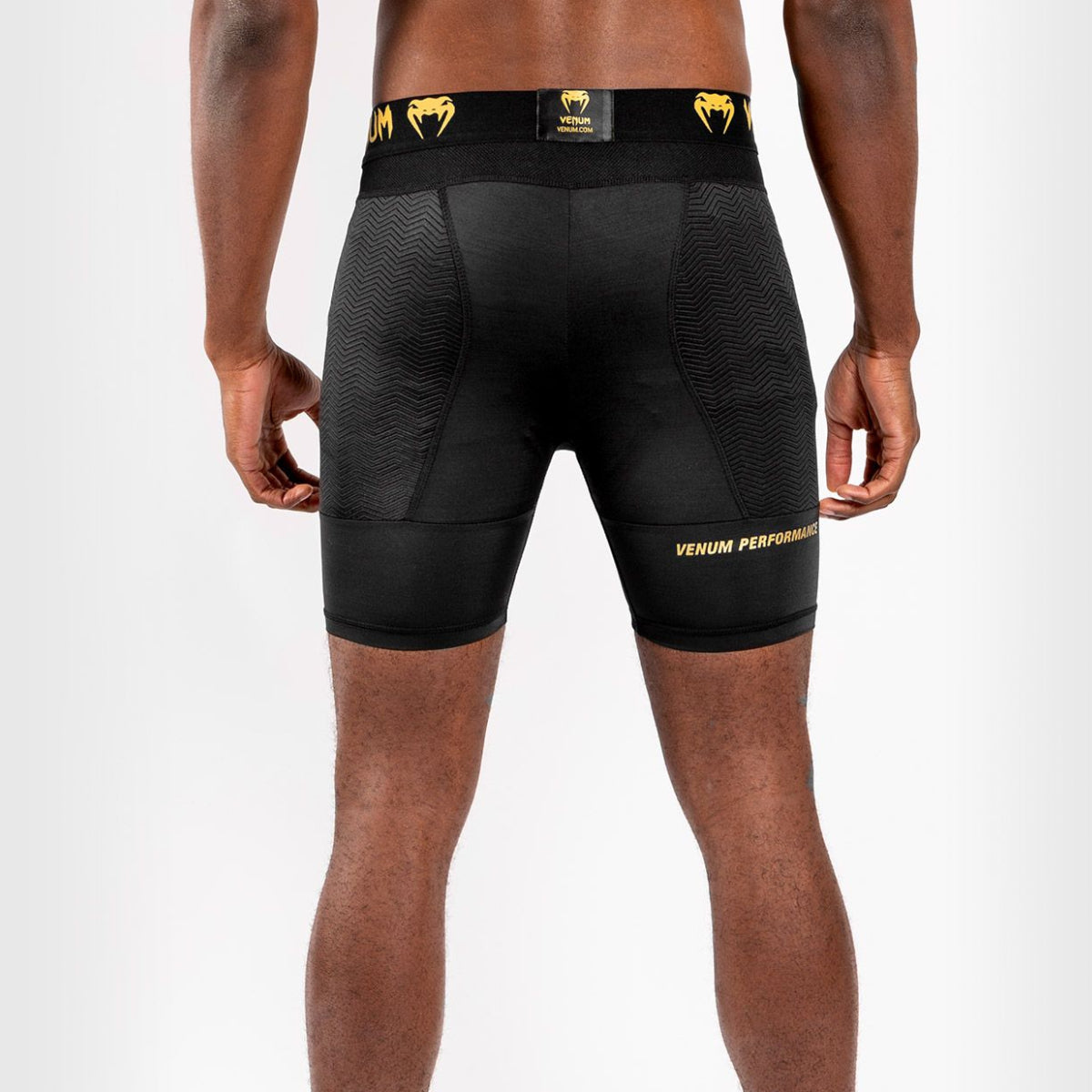 Black/Gold Venum G-Fit Compression Shorts at Bytomic Trade and Wholesale