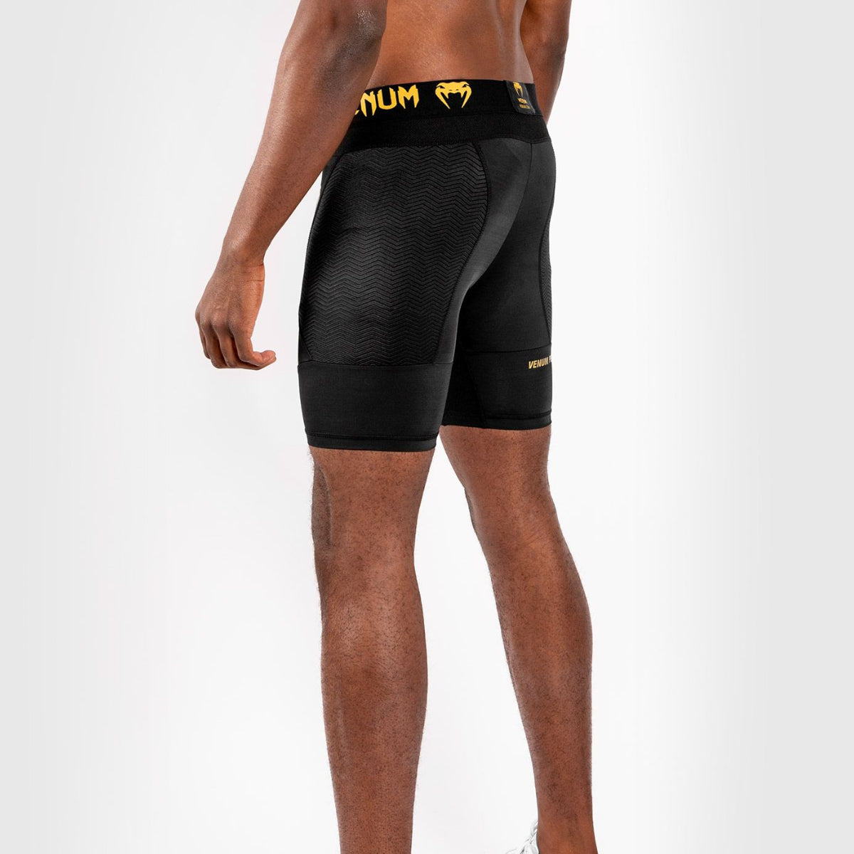 Black/Gold Venum G-Fit Compression Shorts at Bytomic Trade and Wholesale