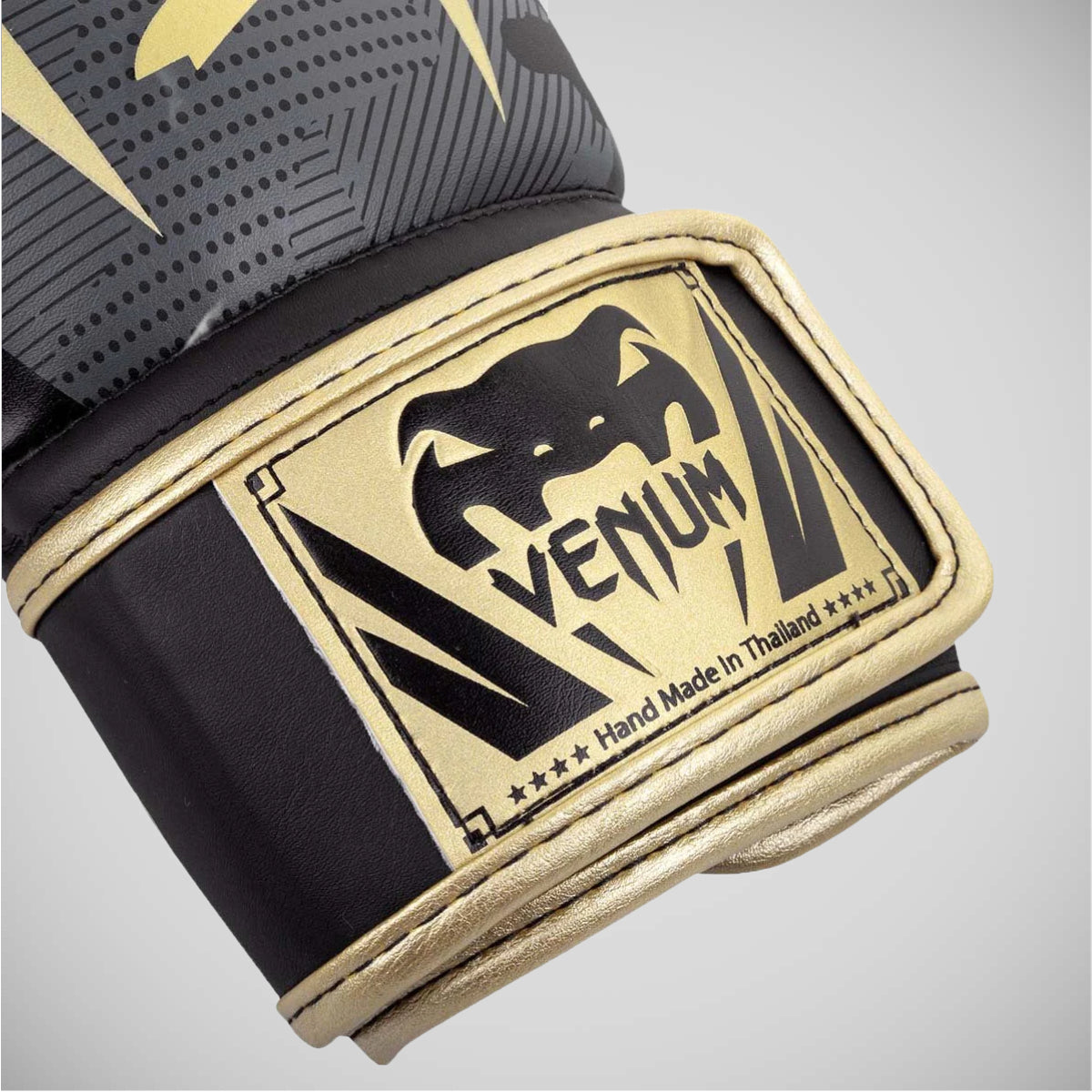 Dark Camo/Gold Venum Elite Boxing Gloves at Bytomic Trade and Wholesale