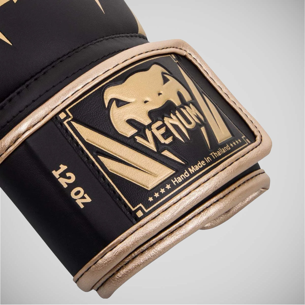 Black/Gold Venum Elite Boxing Gloves at Bytomic Trade and Wholesale
