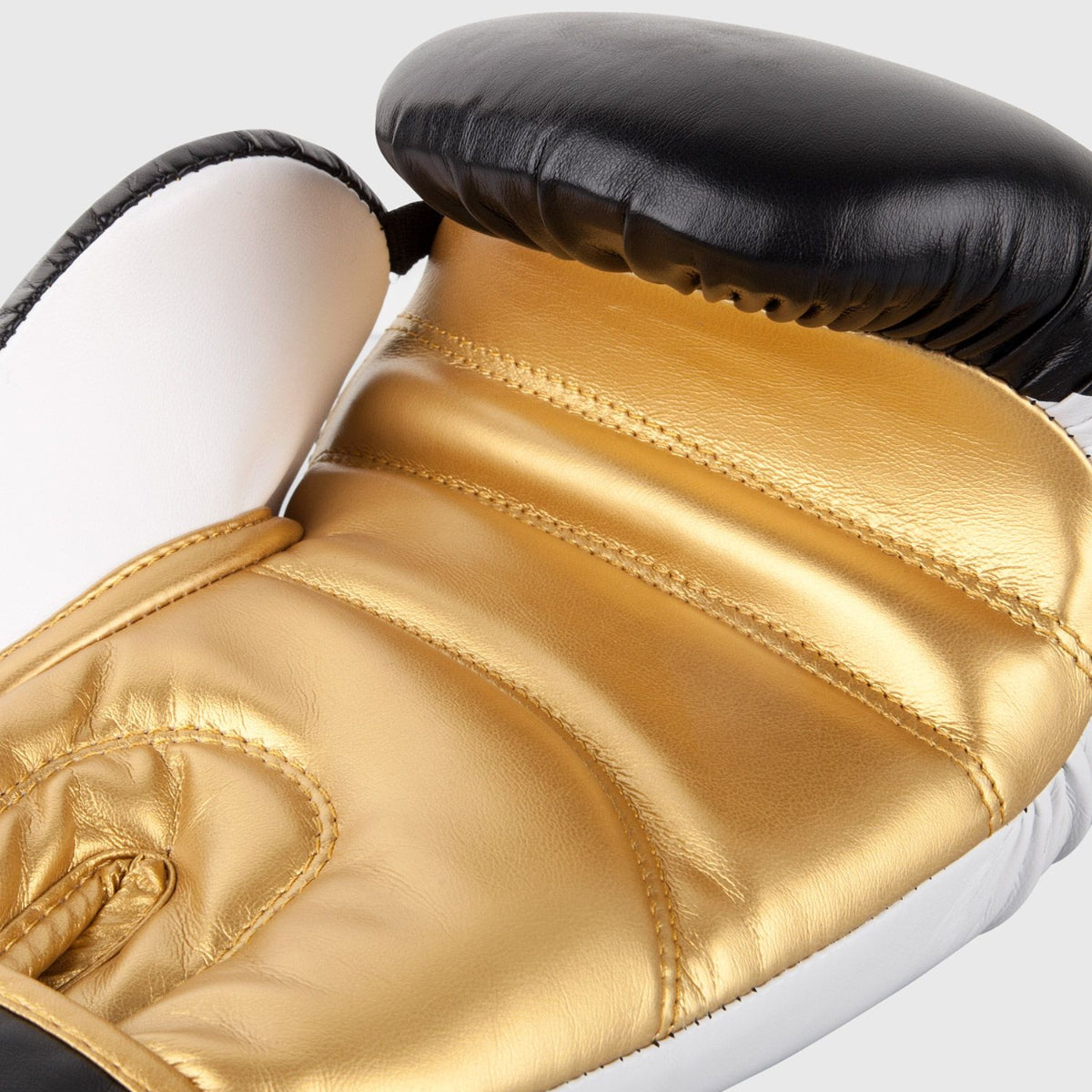 Black/White/Gold Venum Contender 2.0 Boxing Gloves at Bytomic Trade and Wholesale