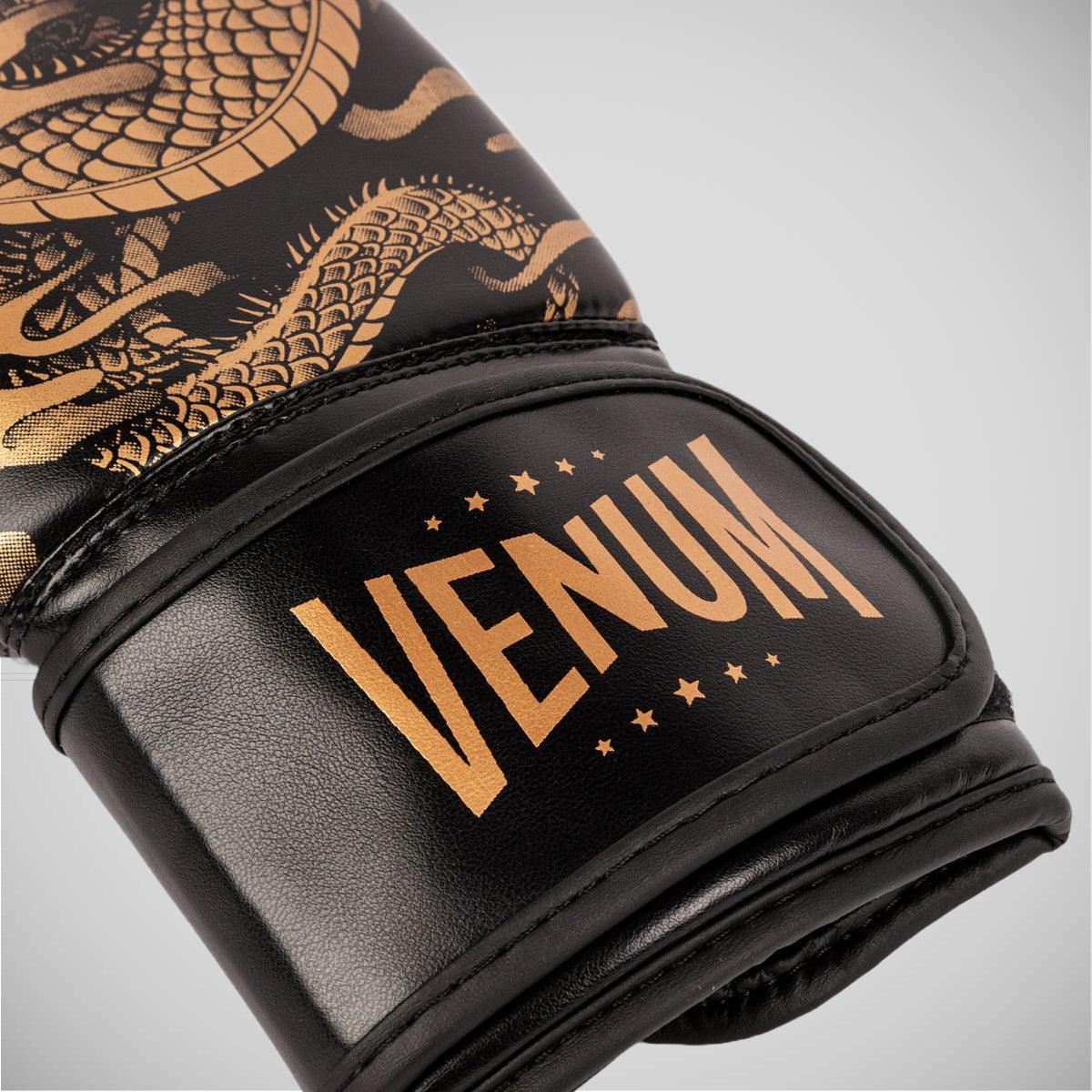 Black/Bronze Venum Dragon's Flight Boxing Gloves at Bytomic Trade and Wholesale