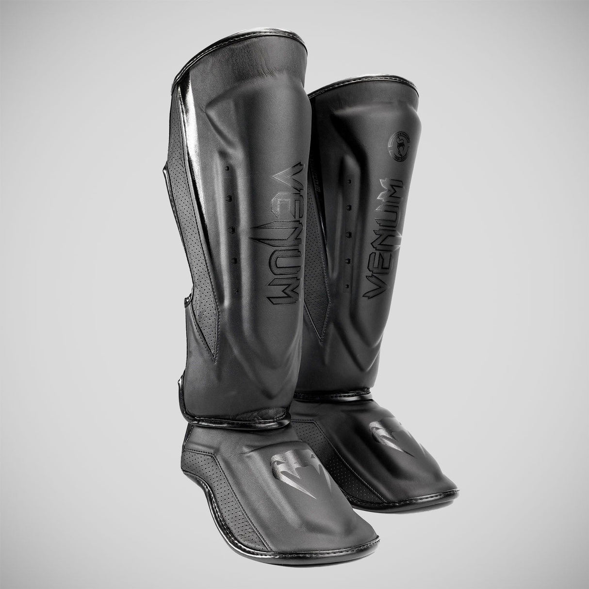 Black/Black Venum Elite Evo Shin Guards at Bytomic Trade and Wholesale