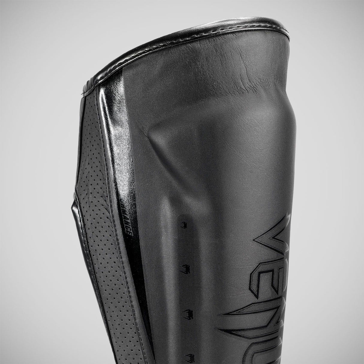 Black/Black Venum Elite Evo Shin Guards at Bytomic Trade and Wholesale