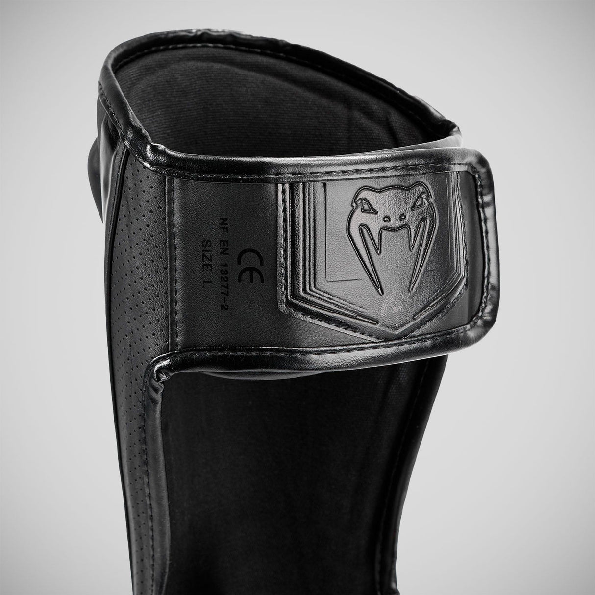 Black/Black Venum Elite Evo Shin Guards at Bytomic Trade and Wholesale