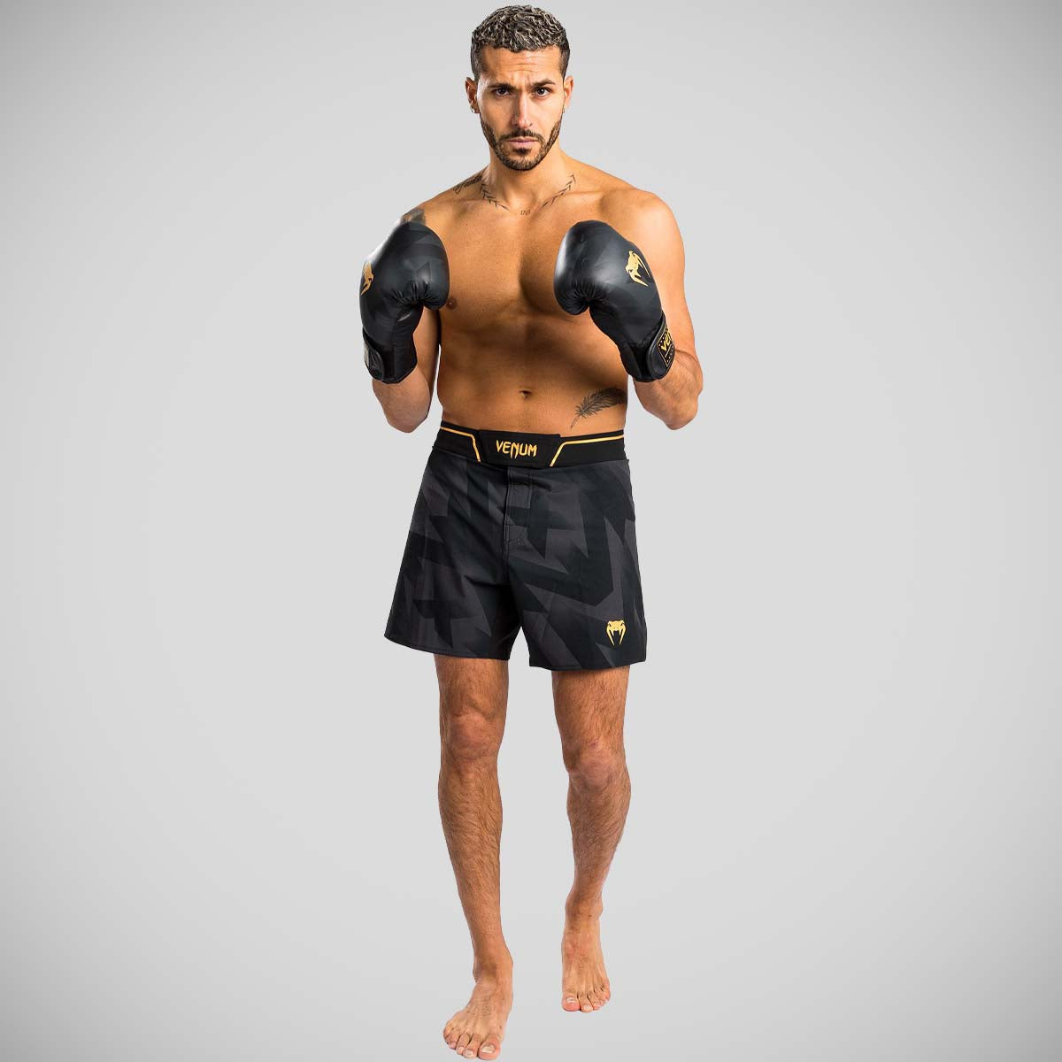 Black/Gold Venum Razor Fight Shorts at Bytomic Trade and Wholesale