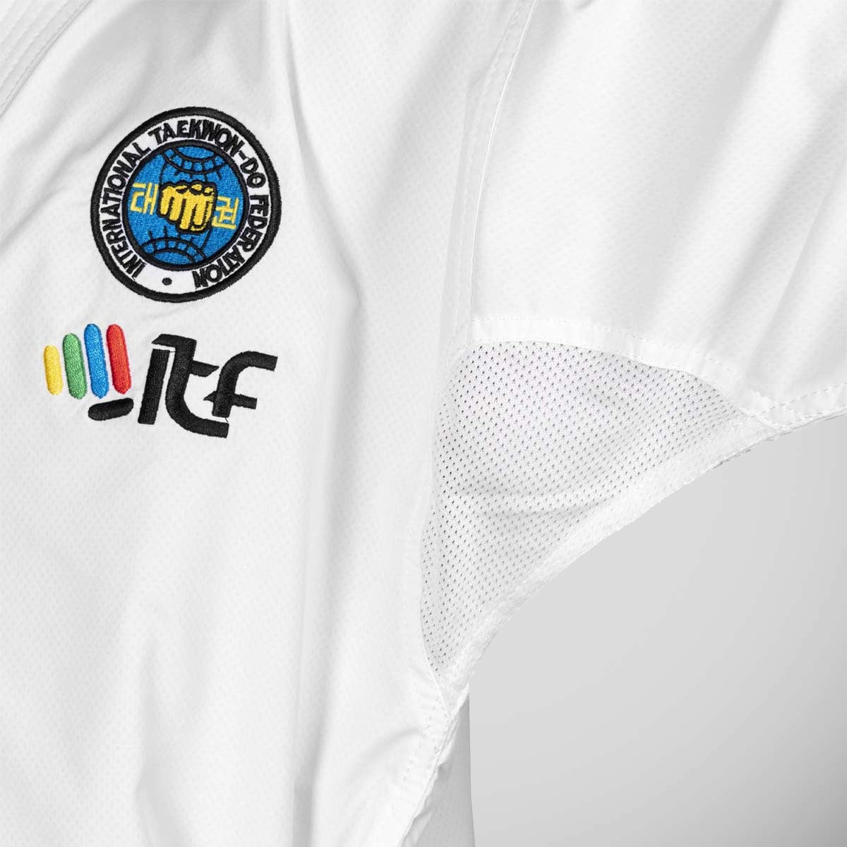 White Top Ten ITF Master Gold Edition Dobok at Bytomic Trade and Wholesale