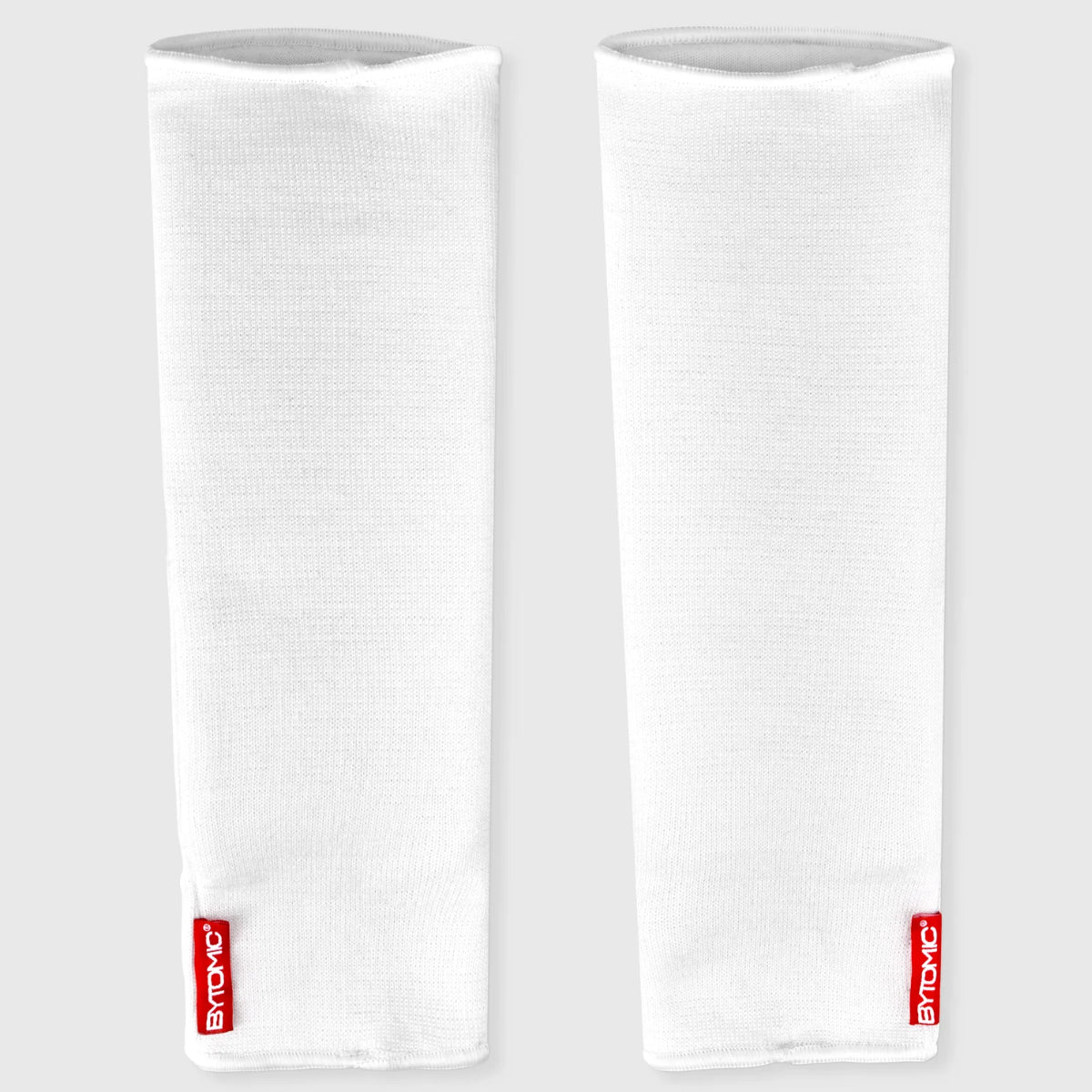 White/Black Bytomic Red Label Elasticated Shin Guards at Bytomic Trade and Wholesale