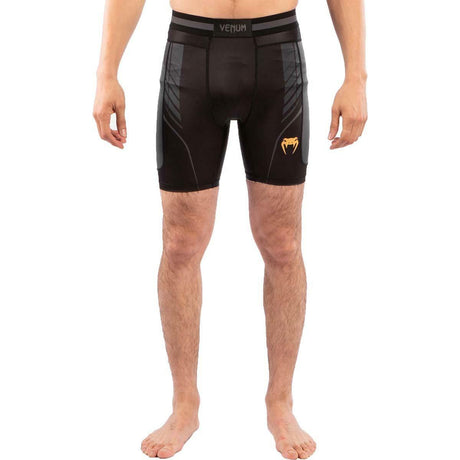 Black-Gold Venum Athletics Vale Tudo Shorts    at Bytomic Trade and Wholesale
