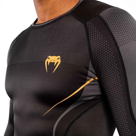 Black-Gold Venum Athletics Long Sleeve Rash Guard    at Bytomic Trade and Wholesale