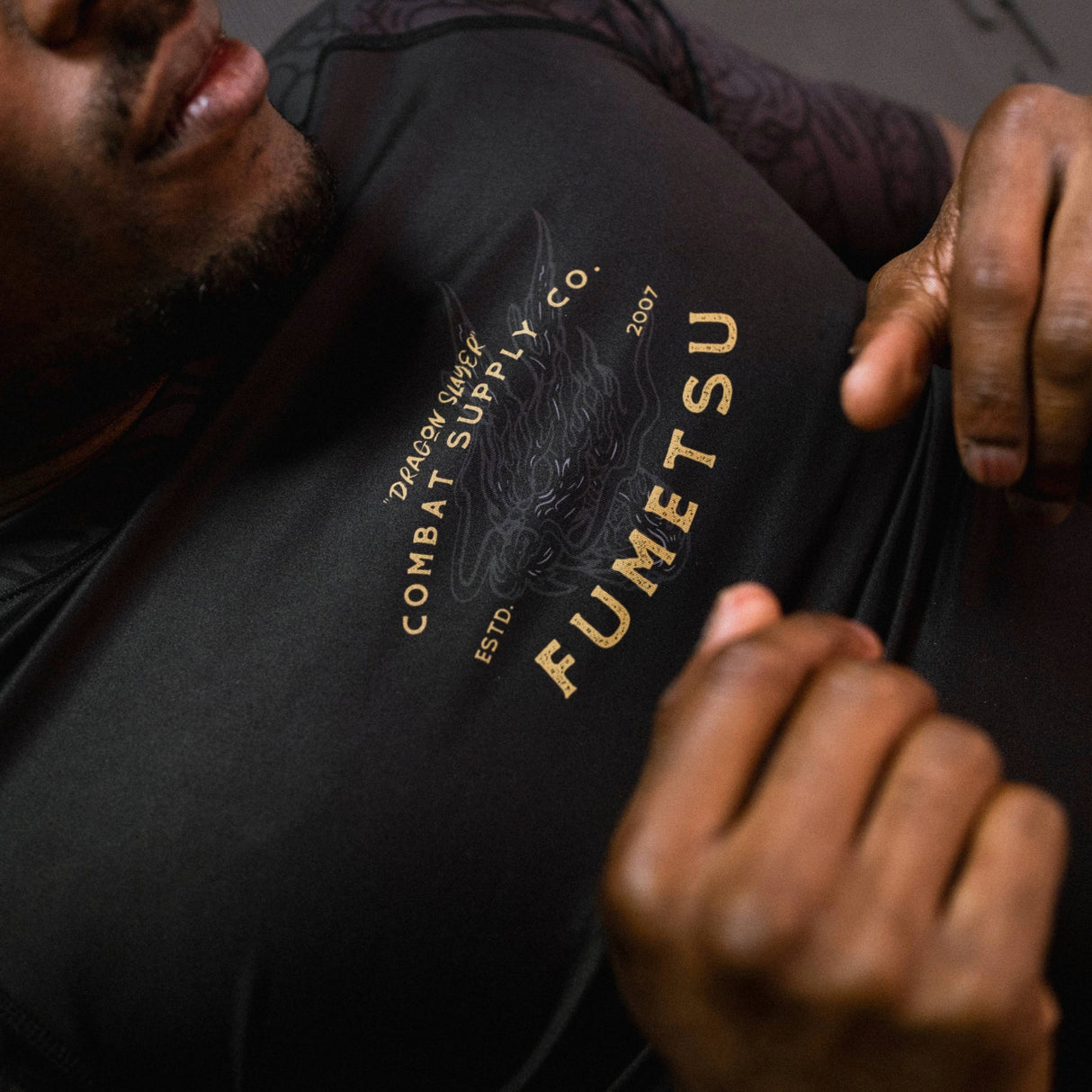 Fumetsu Dragon Slayer Short Sleeve Rash Guard Black/Gold at Bytomic Trade and Wholesale