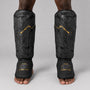 Fumetsu Dragon Slayer Shin Guards Black/Gold