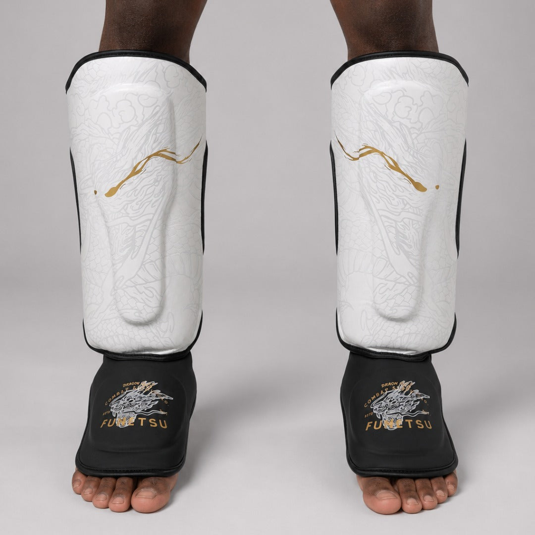 Fumetsu Dragon Slayer Shin Guards White/Black/Gold at Bytomic Trade & Wholesale 1