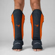 Fumetsu Icon Thai Shin Guards Black/Orange at Bytomic Wholesale