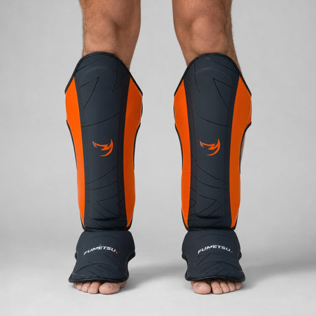 Fumetsu Icon Thai Shin Guards Black/Orange at Bytomic Wholesale