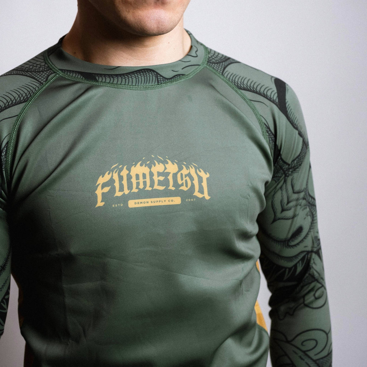 Fumetsu Oni Long Sleeve Rash Guard Khaki/Gold/Black at Bytomic Trade and Wholesale