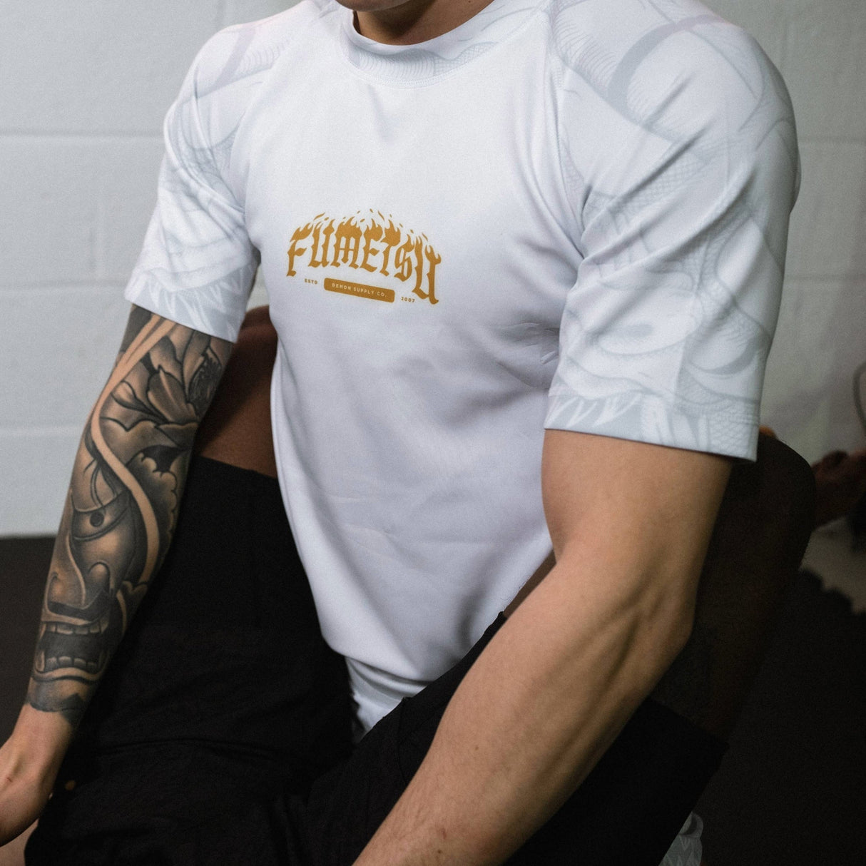 Fumetsu Oni Short Sleeve Rash Guard White/Gold/Grey at Bytomic Trade and Wholesale
