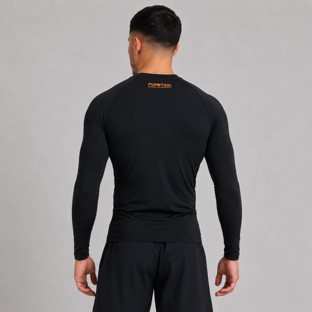 Fumetsu Origins Long Sleeve Rash Guard Black/Orange