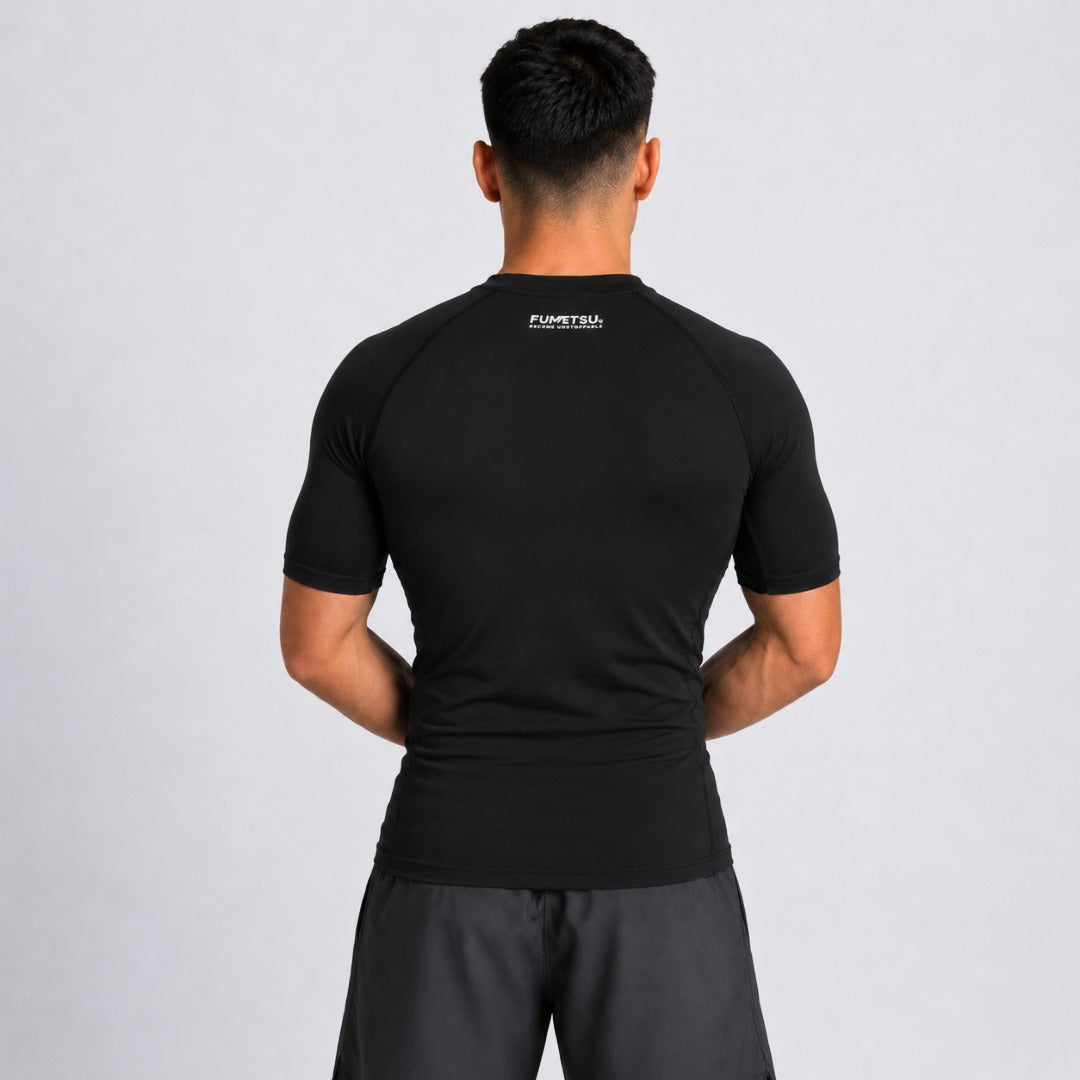 Fumetsu Origins Short Sleeve Rash Guard Black