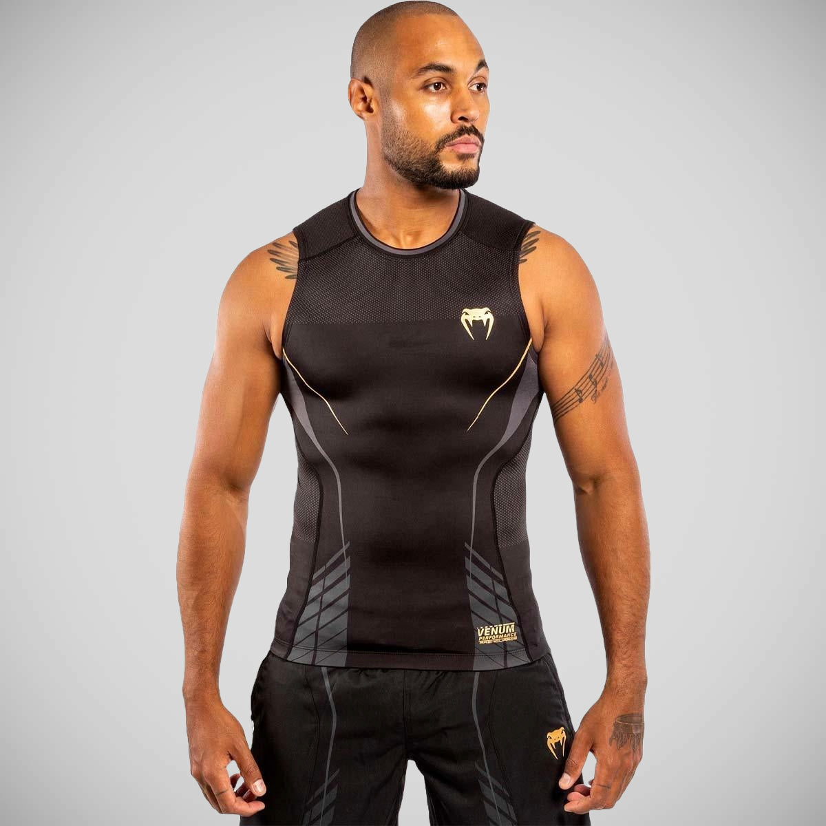 Venum Athletics Sleeveless Rash Guard Black/Gold    at Bytomic Trade and Wholesale