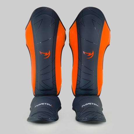 Fumetsu Icon Thai Shin Guards Black/Orange at Bytomic Trade and Wholesale