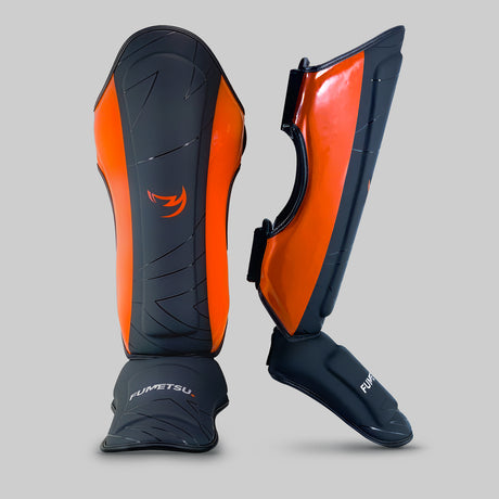 Fumetsu Icon Thai Shin Guards Black/Orange at Bytomic Trade and Wholesale