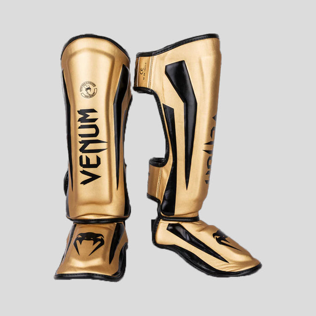 Venum Elite Stand Up Shin Guards Gold/Black at Bytomic Trade and Wholesale